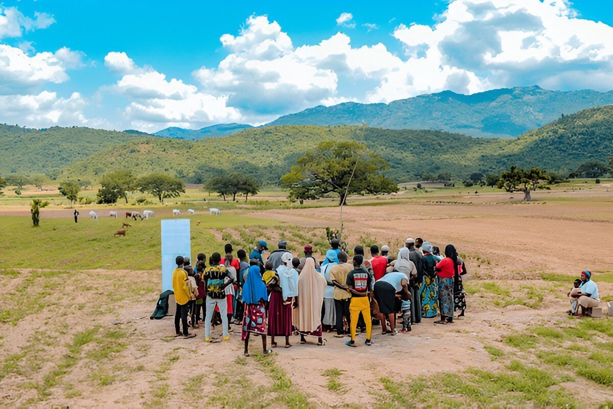 African Community Gathering Under a Baobab Tree